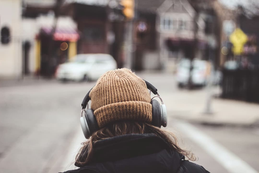 Best Spotify Alternatives Hipster listening to Spotify