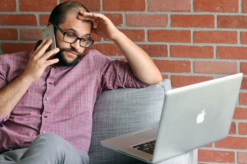 How to Download a Dead Torrent With No Peers or Seeders Frustrated man trying to download a dead torrent on his laptop